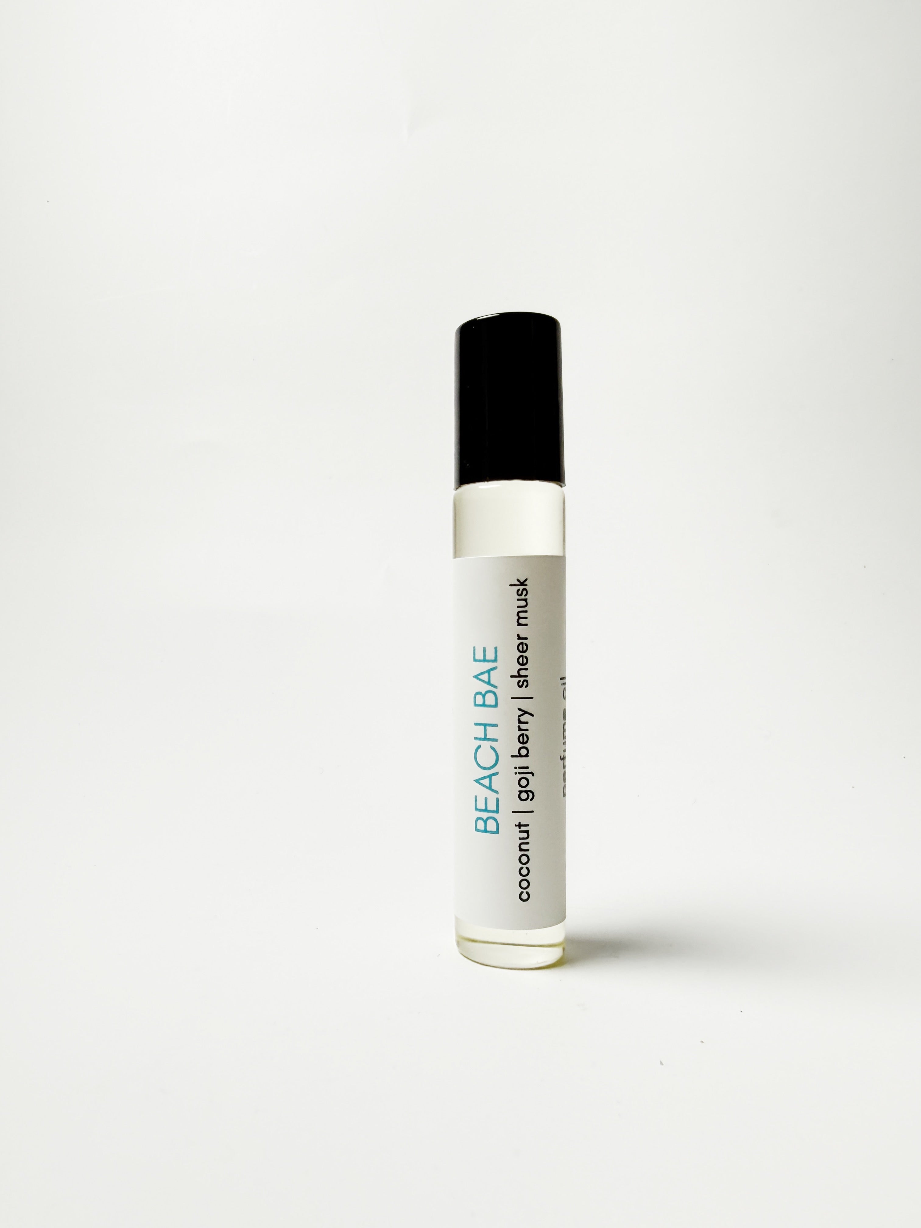 Roll-on bottle labeled 'Beach Bae' on a white background